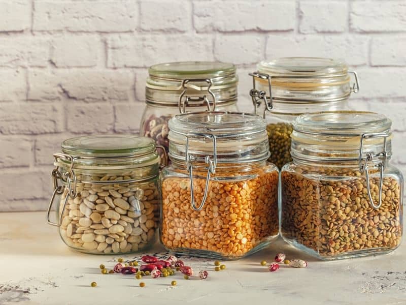 Glass Food Storage with various legumes - beans, mung bean, peas and lentils
